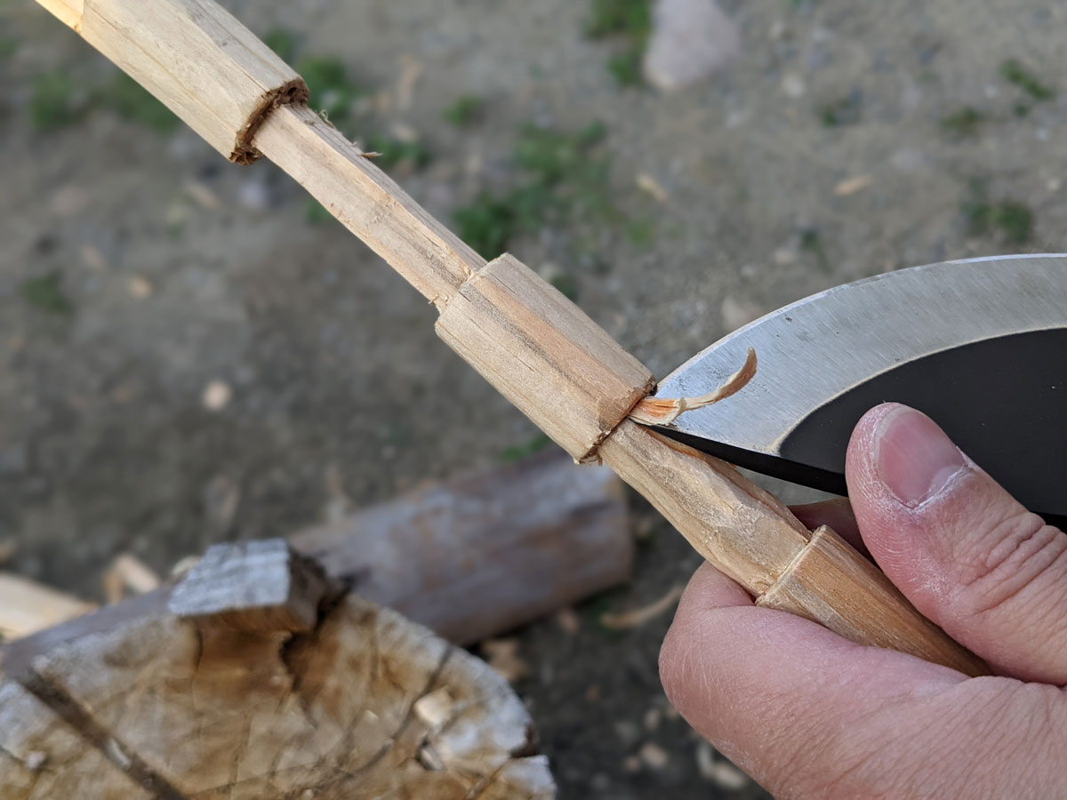 Jaime de la Parra working the SLYSTEEL Survival Kukri knife at the tip for try stick diameter reduction. Photograph by Brandon Barlow.